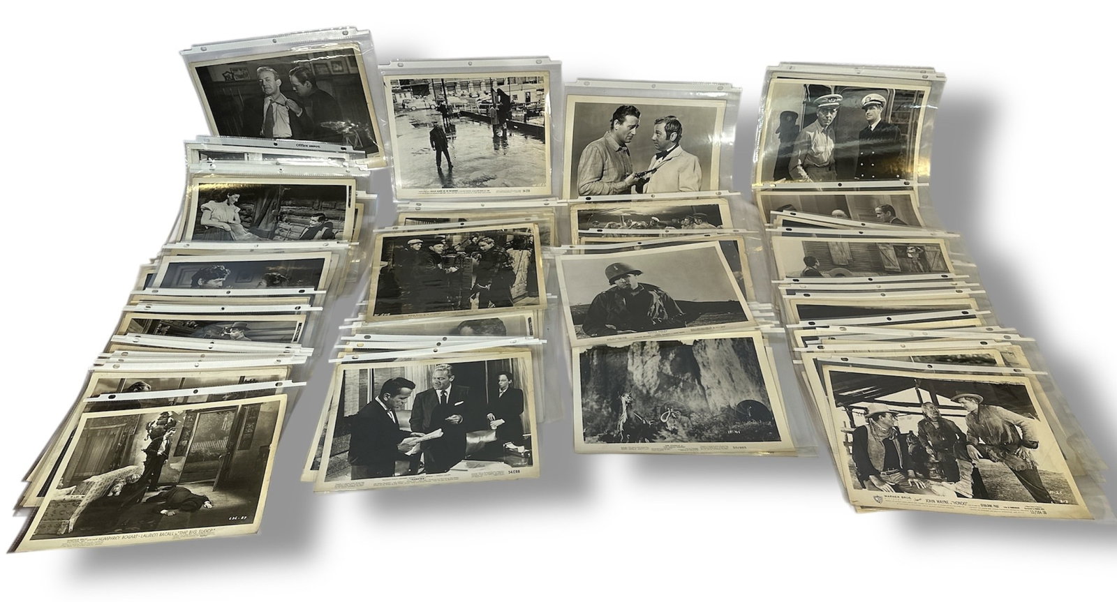 Collection of Vintage Movie Stills, MARLON BRANDO, CLARK GABLE, CARY GRANT: Most are approx. 8" H x 10" W. Also feature individuals including Humphrey Bogart, John Wayne, Lauren Bacall, and more. Approx 80+ pieces.