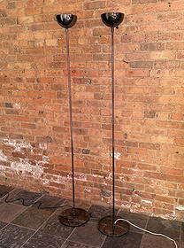 A Pair of ROBERT SONNEMAN Smoked Chrome "Torchiere" Floor Lamps: 73.5" H x 7" shade diameter x 12" base diameter.