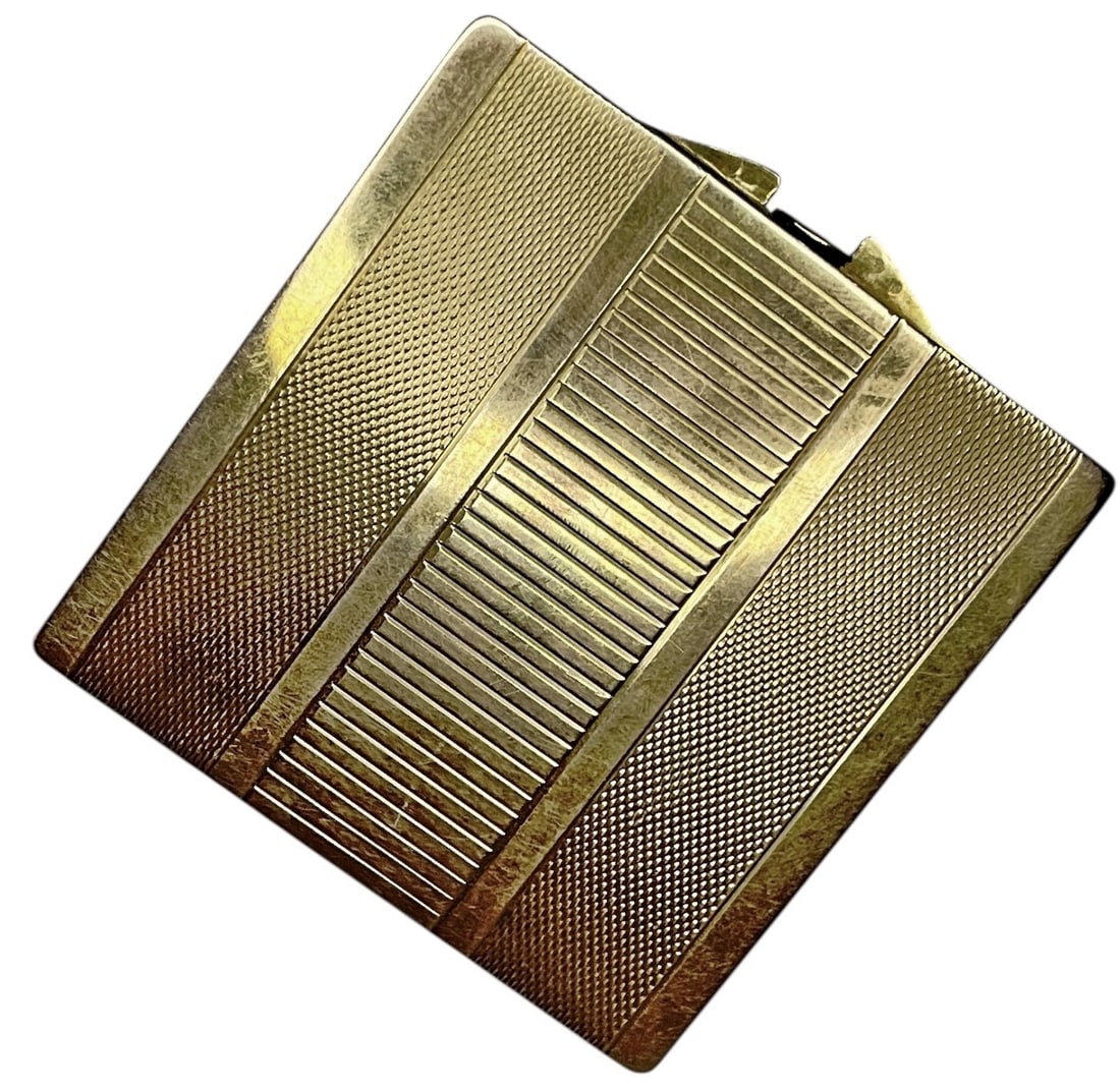 An 18k Gold Vintage Makeup Compact: Measures 2.5" x 2.5" x .25". Still retains mirror and interior. Weighs 4.47ozt.