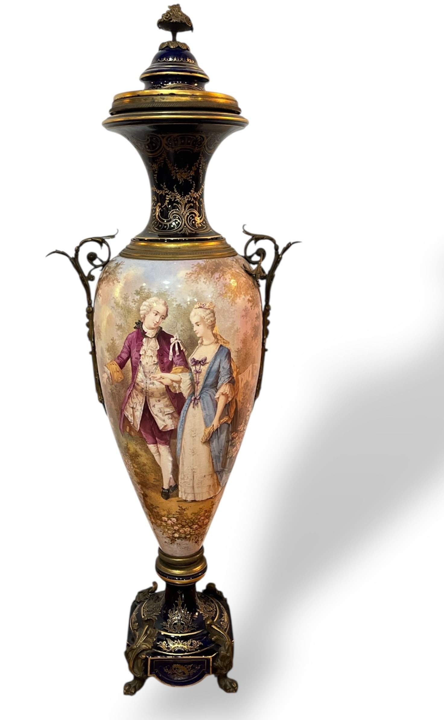 Sevres Style Porcelain and Ormolu Urn, Signed POITEVIN: Measures 41" Hx 16" W x 8" x 8" at the base. Signed Poitevin.