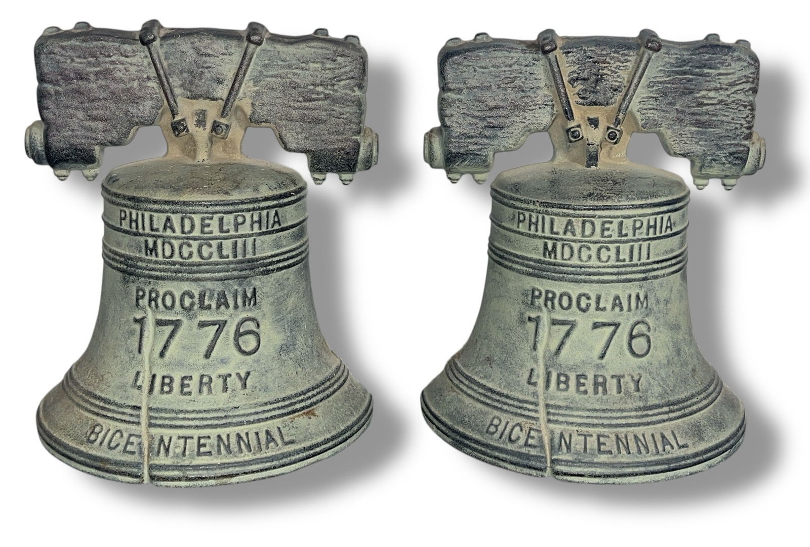 Vintage LIBERTY BELL Bicentennial Bookends: 6.25" H x 5" W x 4" D. Cast metal.