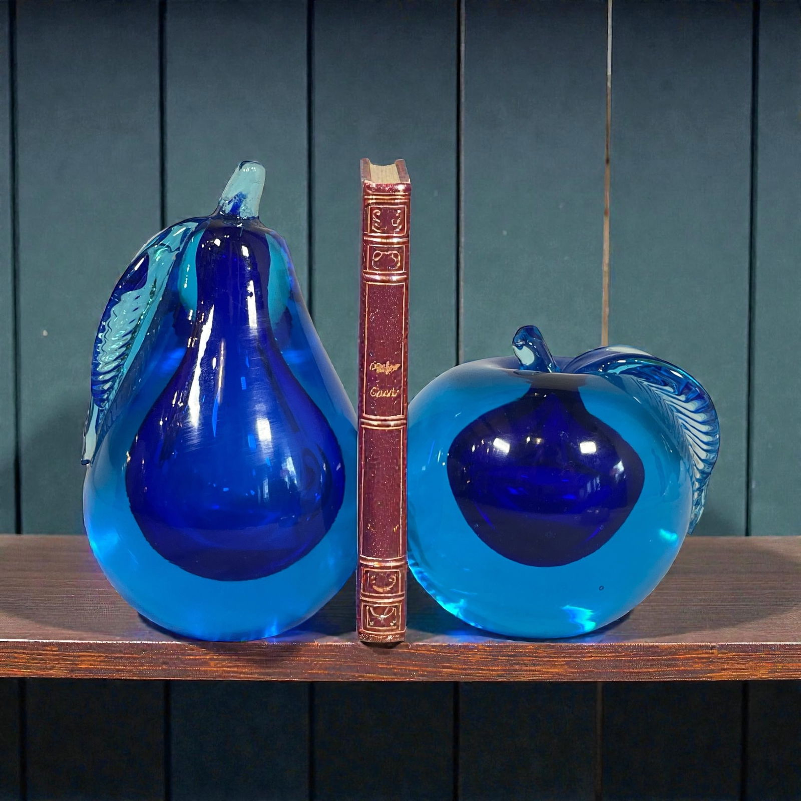 Two MURANO SOMMERSO Art Glass Fruit Bookends: The pear measures 6" H x 4" W x 4" D, the apple measures 4" H x 4" DIA. Possibly by Alfredo Barbini.