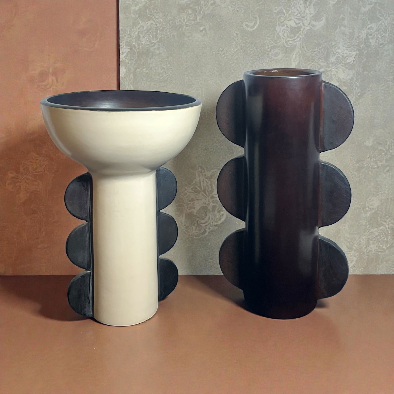 Two Modernist Scalloped Vases, DIEGO OLIVERO: Marked Diego Olivero on the bottom of each. Feature in Architectural Digest and very similar in form to many works by Jonathan Adler. The taller vase measures 16" H x 9.5" W x 5" DIA, the shorter meas