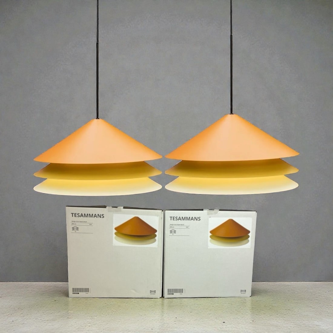 Two IKEA TESAMMANS Pendant Lamp Shades: Both have their original box and black lighting cord kit. Each shade measures approx. 13.25". Each box measures 5" hx 14.5" W x 14" D. Image shows example of how shade goes together.