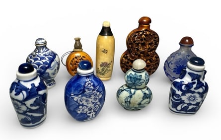 A Collection of 9 Snuff Bottles