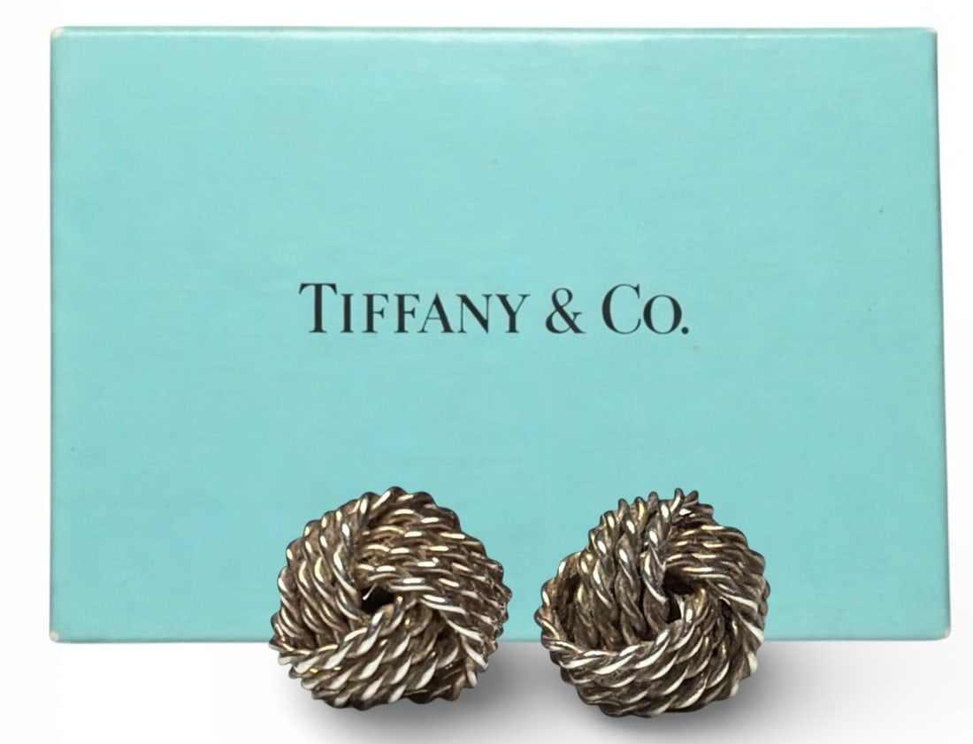 Sterling Silver TIFFANY & CO. Love Knot Earrings: Marked 925 sterling silver and weigh 1.56dwt. Lot includes Tiffany & Co. box.
