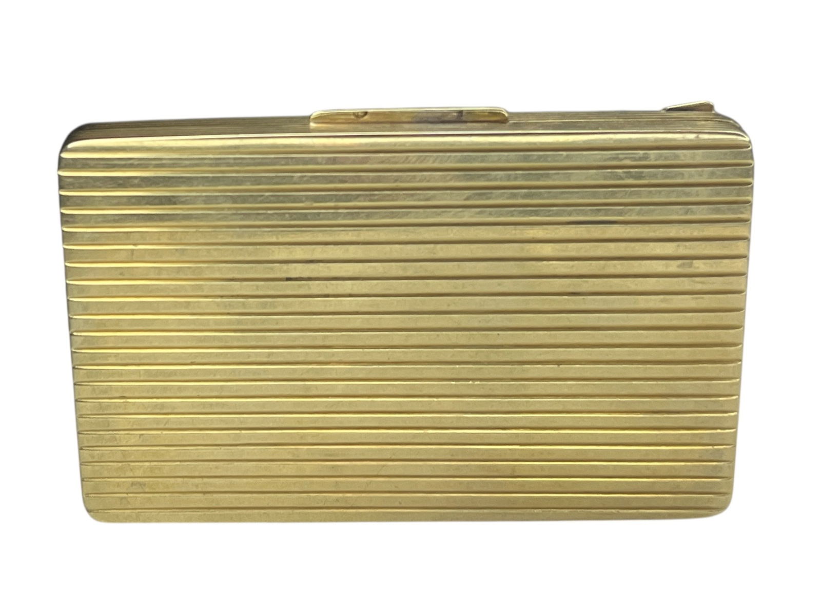 A 14k Gold Ribbed Cigarette Case: Measures 3" x 2" x .25". Weighs 31.93dwt.