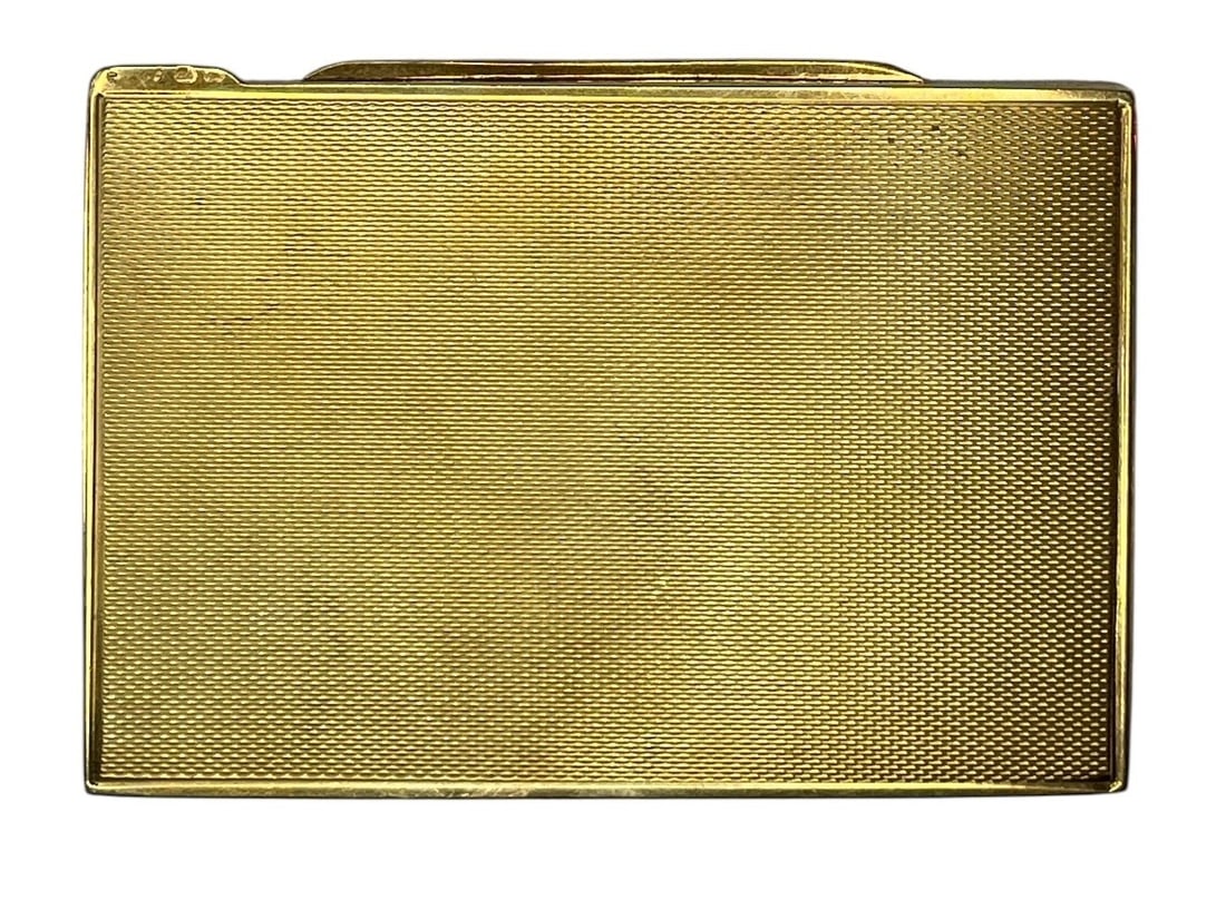 A 14k Gold Vintage Cigarette Case: Measures 3" x 2" x .25". Weighs 32.39dwt.