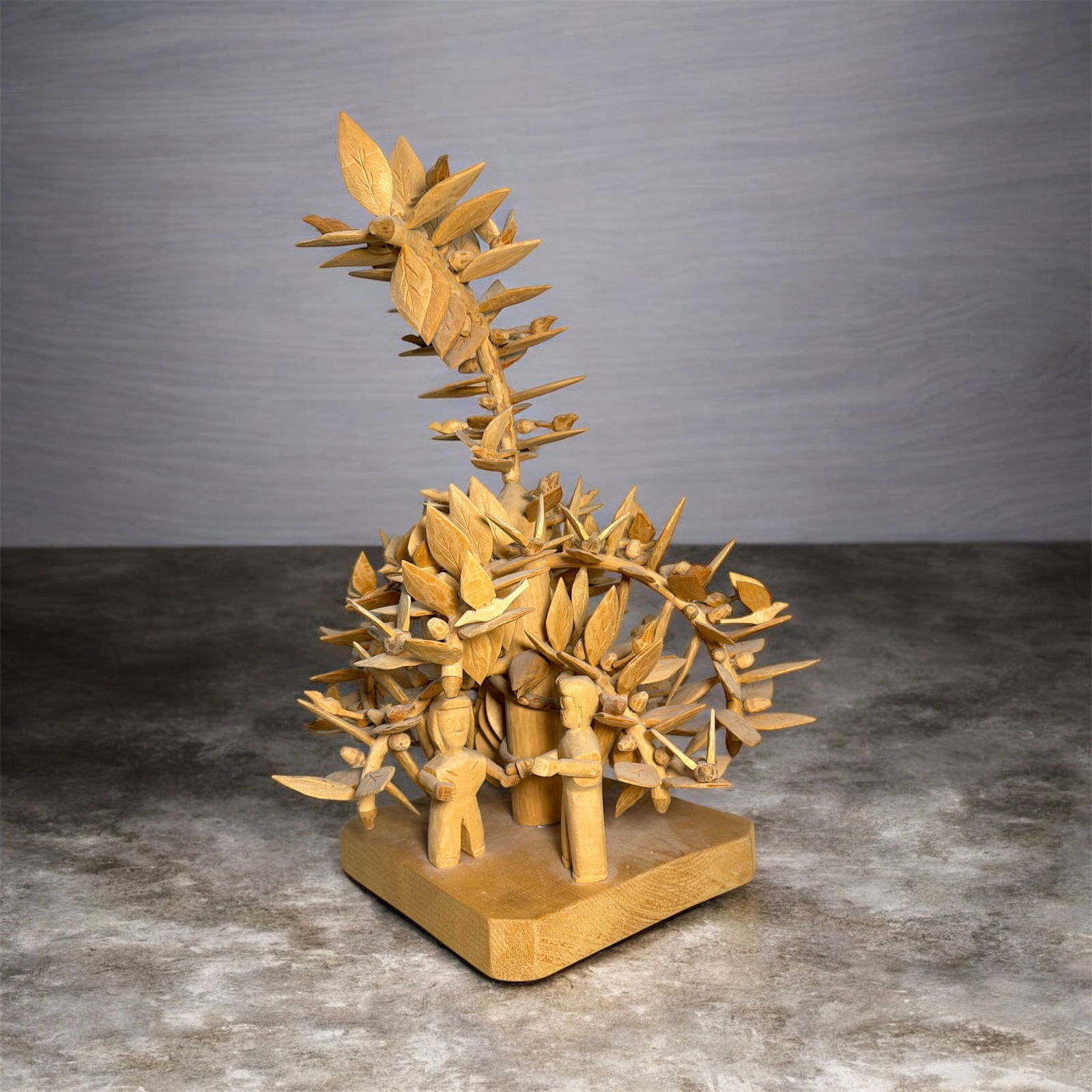 RICARDO LOPEZ, Garden of Eden Carved Cottonwood Sculpture: Depicts Adam and Eve in the garden of Eden with the snake. Measures 22" H x 16" W x 16" D. Signed by the artists on the bottom, Ricardo and Nora Lopez. Ricardo is the son of artist George T. Lopez. Ge