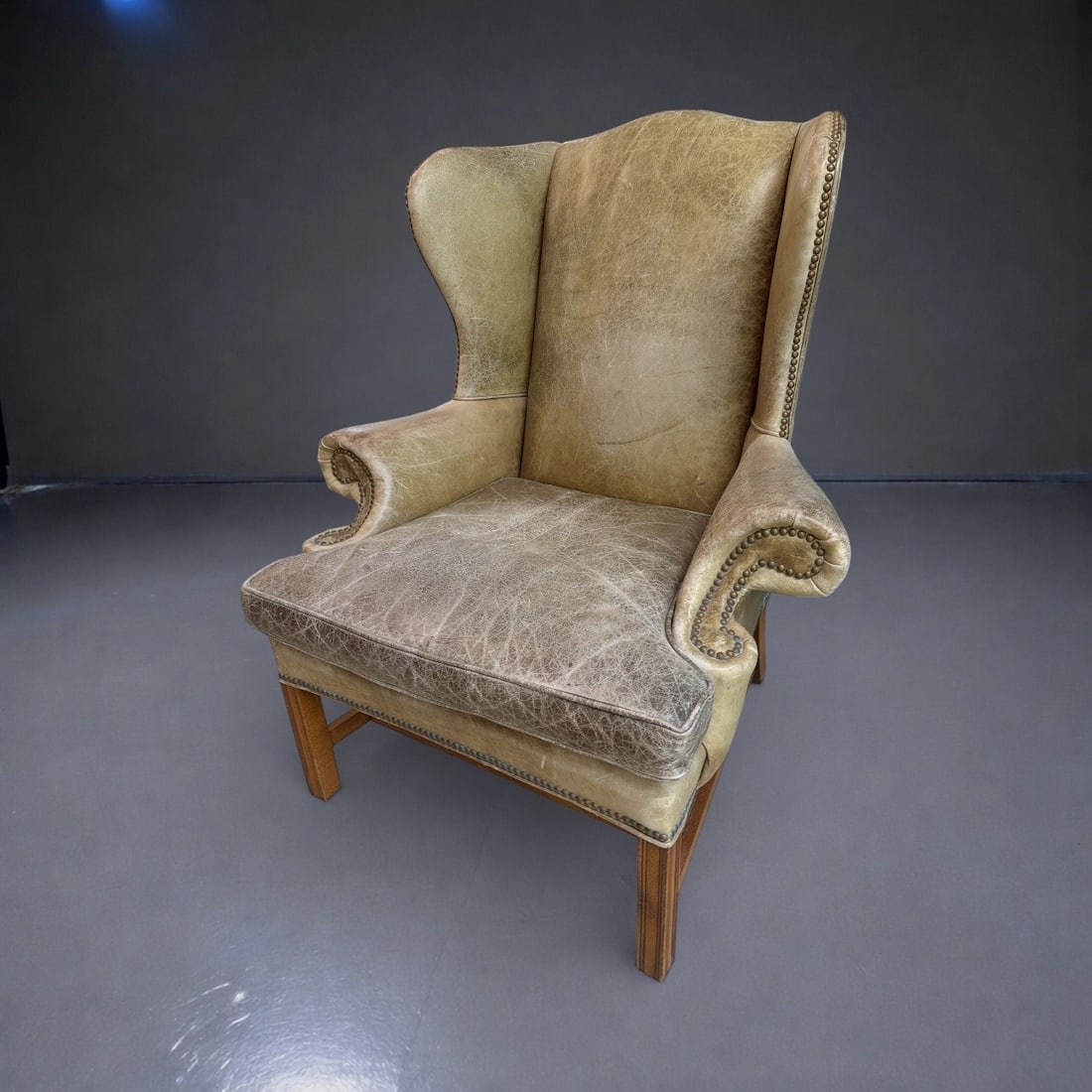 RALPH LAUREN "Devonshire" Leather Wing Chair: Measures 47" H to the back, 19.5" H to the seat x 39" W x 38" D. Does not retain label.