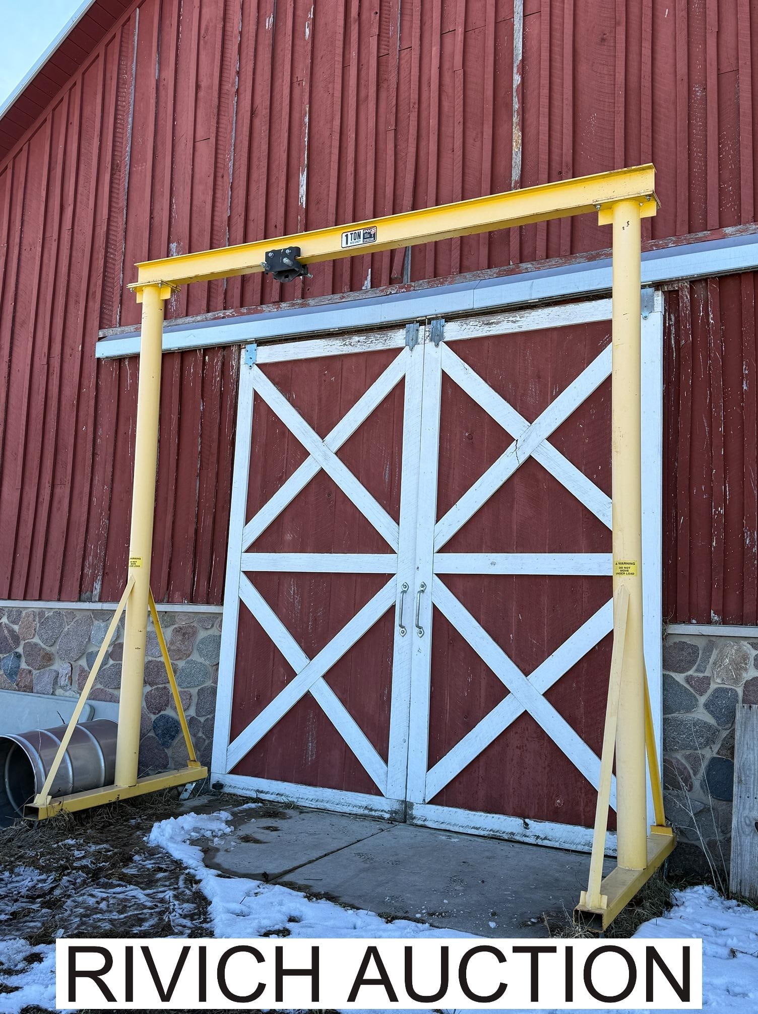 PWI Works 1 Ton Gantry Crane: Comes with the CM Series 622 load chain attachment. Buyer is responsible for dissasembly at pickup. NOTE: Item pickup is in Valparaiso, IN - address to be released to successful buyers post auction. S