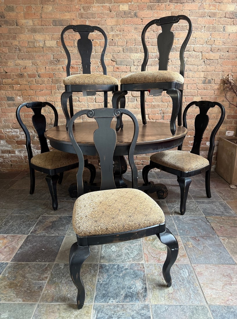 An American Traditional Round Dining Table & Chairs: Table measures 30.5" H x 54" Dia top, Chairs measure 40" H to back, 19" H to seat x 23" W x 23" D, the look of this table is intentionally distressed.