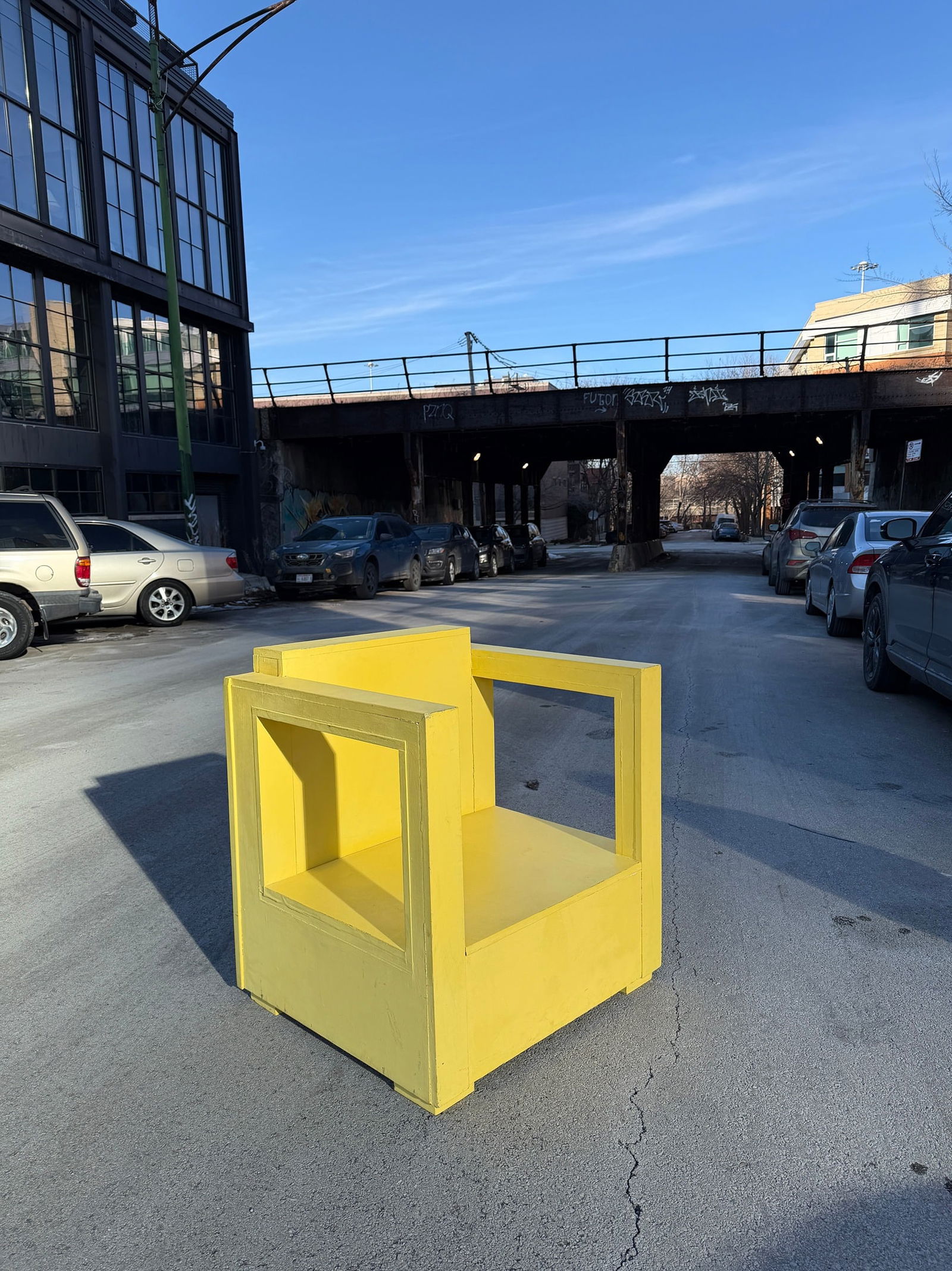 Oversized Handmade Folk Art Chair: Measures 25" H to the back, 13.25" H to the seat x 31.5" W x 28.25" D.