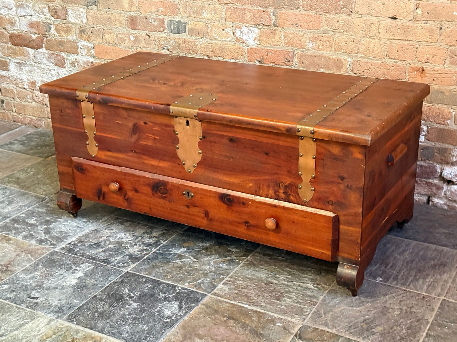 Antique Cedar Chest: Solid Cedar construction, copper trimmed. 20.25" H x 46.5" W x 22" D