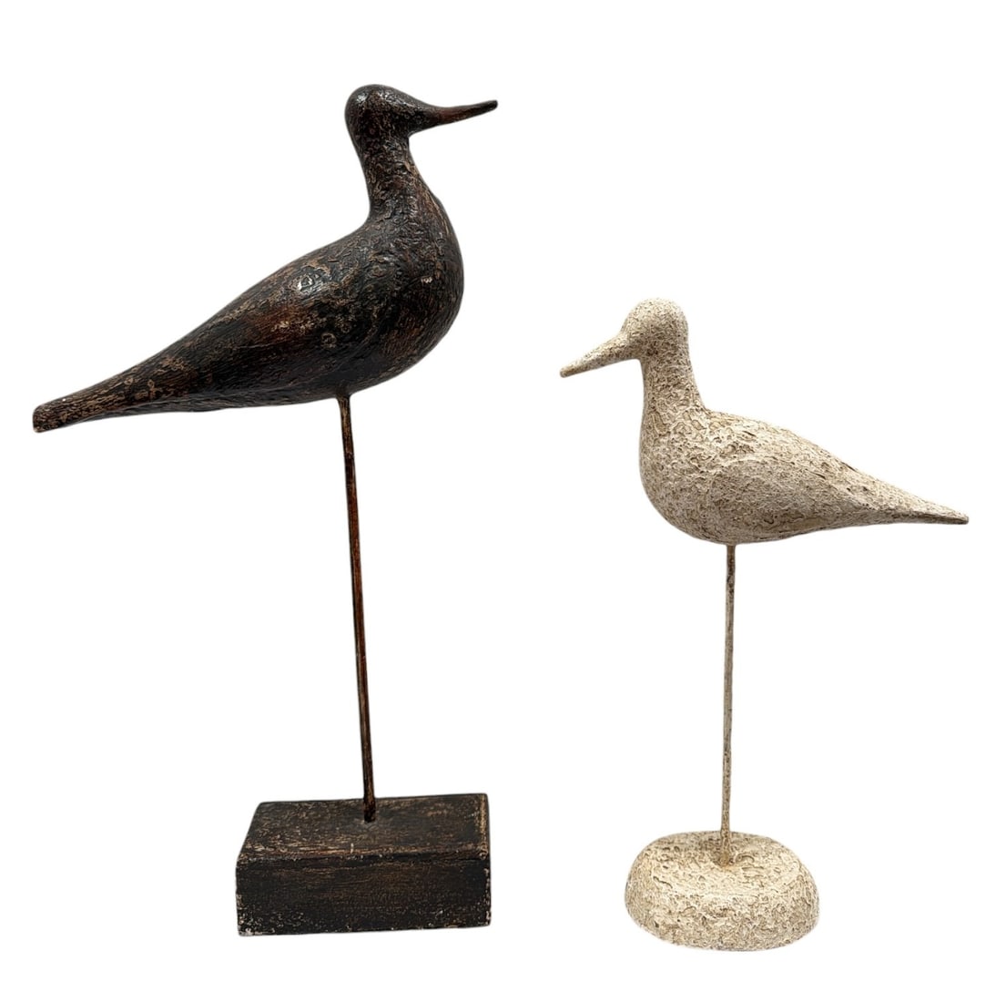Two Shore Bird Decoy Sculptures: The taller one measures 22" H x 5" W x 13" D, the shorter measures 16.5" H x 4" W x 11" D.