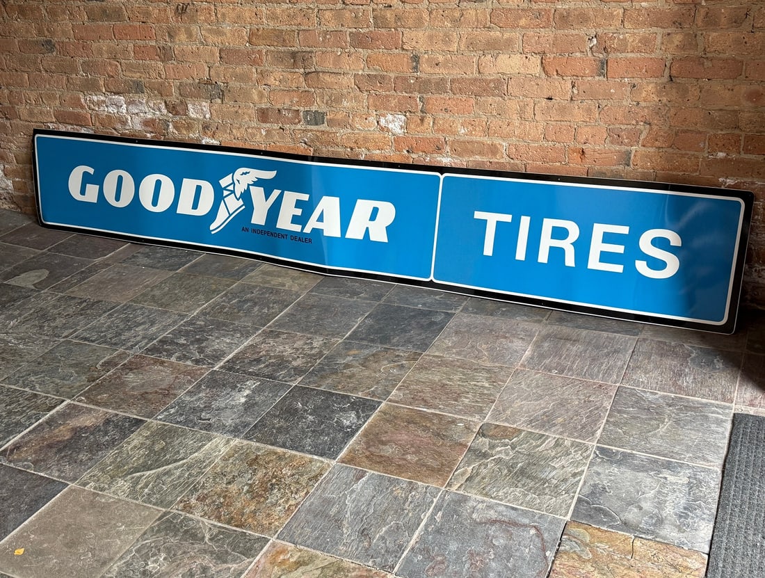 Vintage NOS 10 Foot GOODYEAR TIRE Advertising Sign: New old stock. Metal. 18" H x 120" W. From a multi-generational, family-owned service station in Chicago.