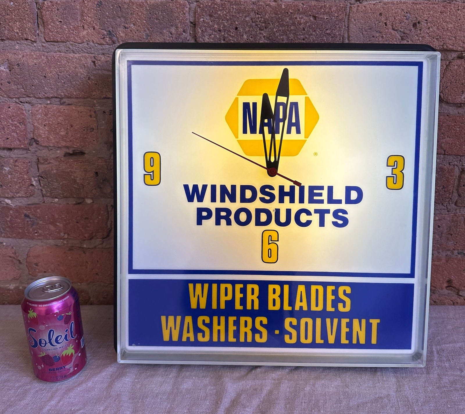 Vintage NAPA Windshield Products Advertising Clock: Running and working, New Old Stock never used. Will ship with original packaging. Clock runs and lights up. 15.75" H x 15.75" W x 5" D. From a multi-generational, family-owned service station in