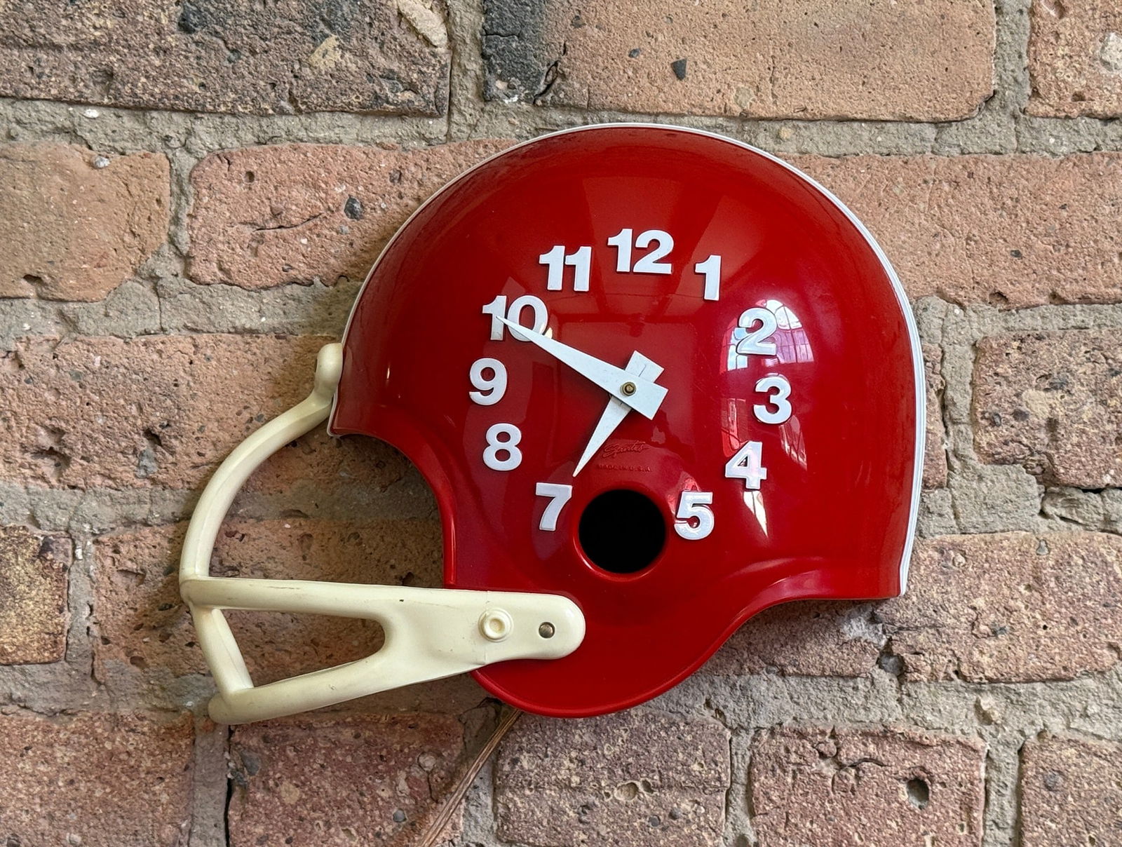 Football Helmet Bar Advertising Clock: Measures 10" H x 12" W x 5" D. Was used in a Chicago bar for over 40 years.