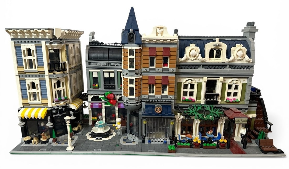 Two LEGO Creator Expert Sets, Assembly Square & Parisian Restaurant: Contains LEGO Creator Expert Assembly Square (set number 10255) and LEGO Creator Expert Parisian Restaurant (set number 10243). Does not contain instruction manuals or boxes. Measures 13" H x 25.25"