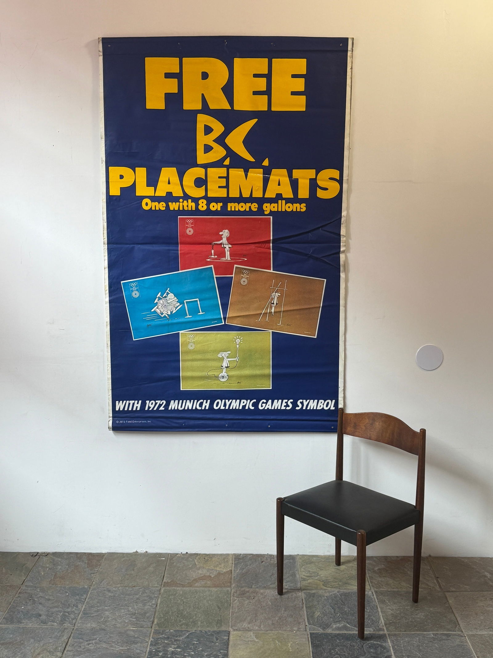 Vintage JOHNNY HART "B.C." Comics 1972 MUNICH OLYMPIC GAMES Promotional Advertising Poster: Rhino-Film 70.5" H x 44" W. From a multi-generational, family-owned service station in Chicago.