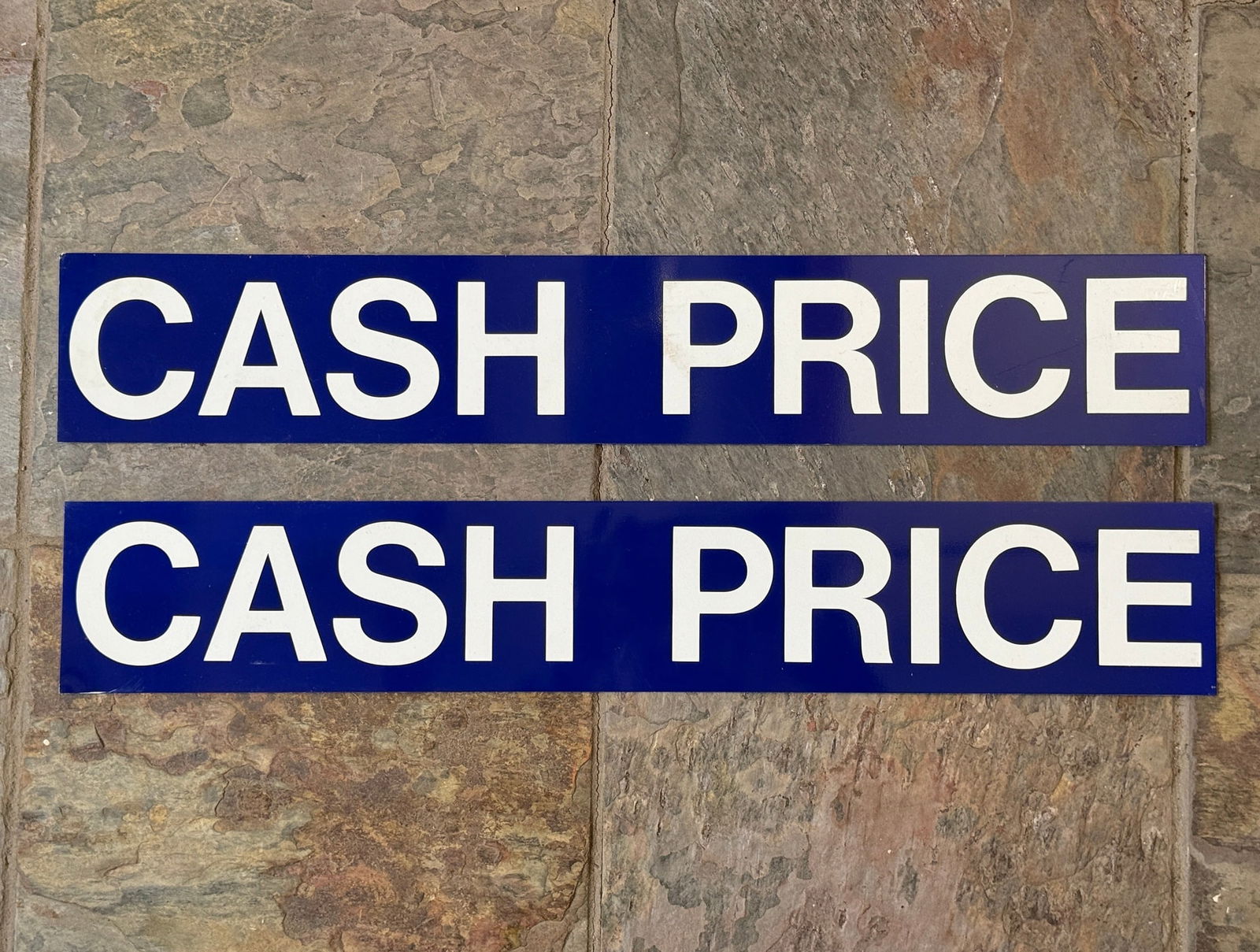 Vintage "Cash Price" Advertising Signs (2): Thinner gauge steel. 4" H x 24" W. From a multi-generational, family-owned service station in Chicago.