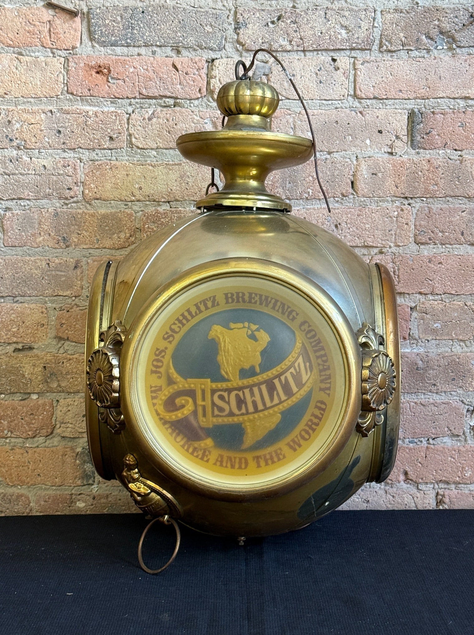 Vintage SCHLITZ Beer Rotating Advertising Clock: Measures 26" H x 16" W x 16" D. Was used in a Chicago bar for over 40 years.