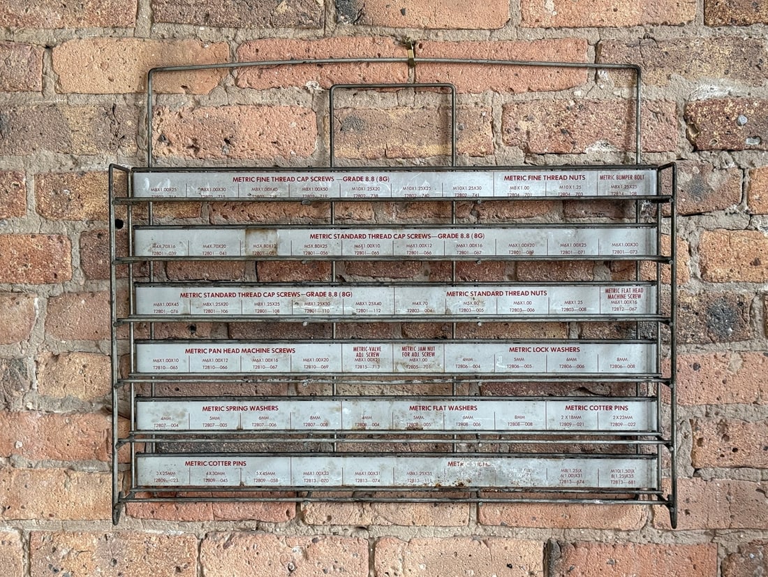 Vintage Hardware Store Advertising Display: Metal. For screws, washers, bolts, etc. 22" H x 25.5" H x 5" D. From a multi-generational, family-owned service station in Chicago.