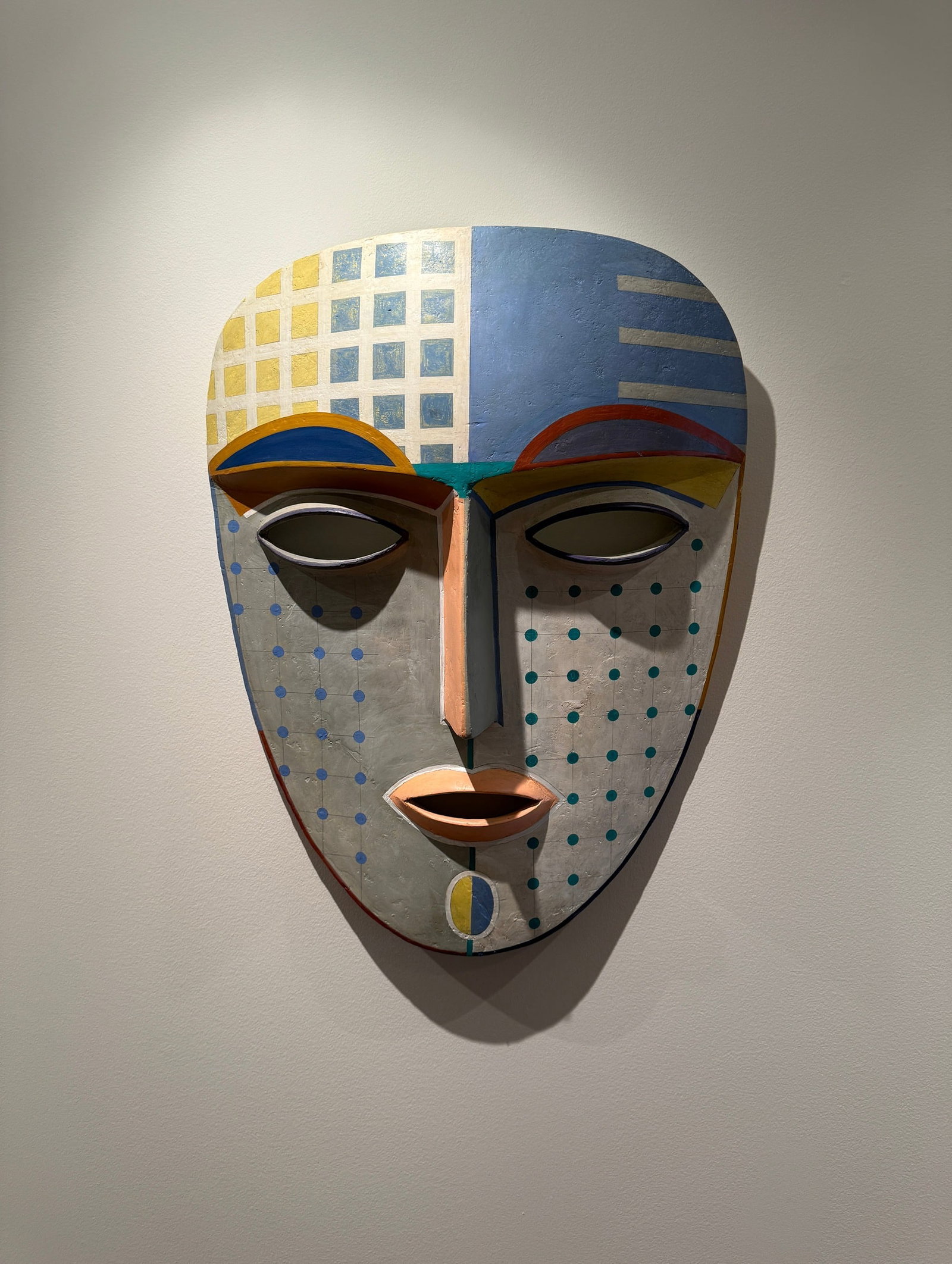 JAGDISH CHINTALA (Indian, B. 1956) Large Papier Mache Mask Wall Sculpture: Measure approx. 28" H x 23" W x 5" D. Signed by the artist and dated 2000.