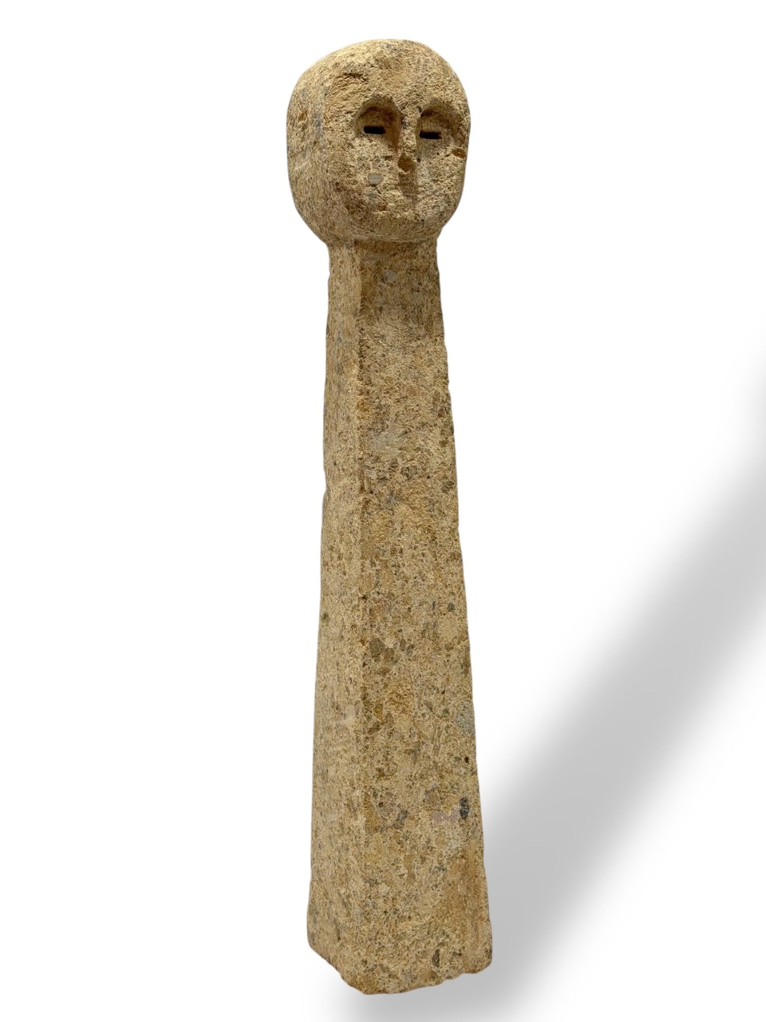 Modernist Stone Man Standing Sculpture: Measures 24" H x 4" W x 4" D.