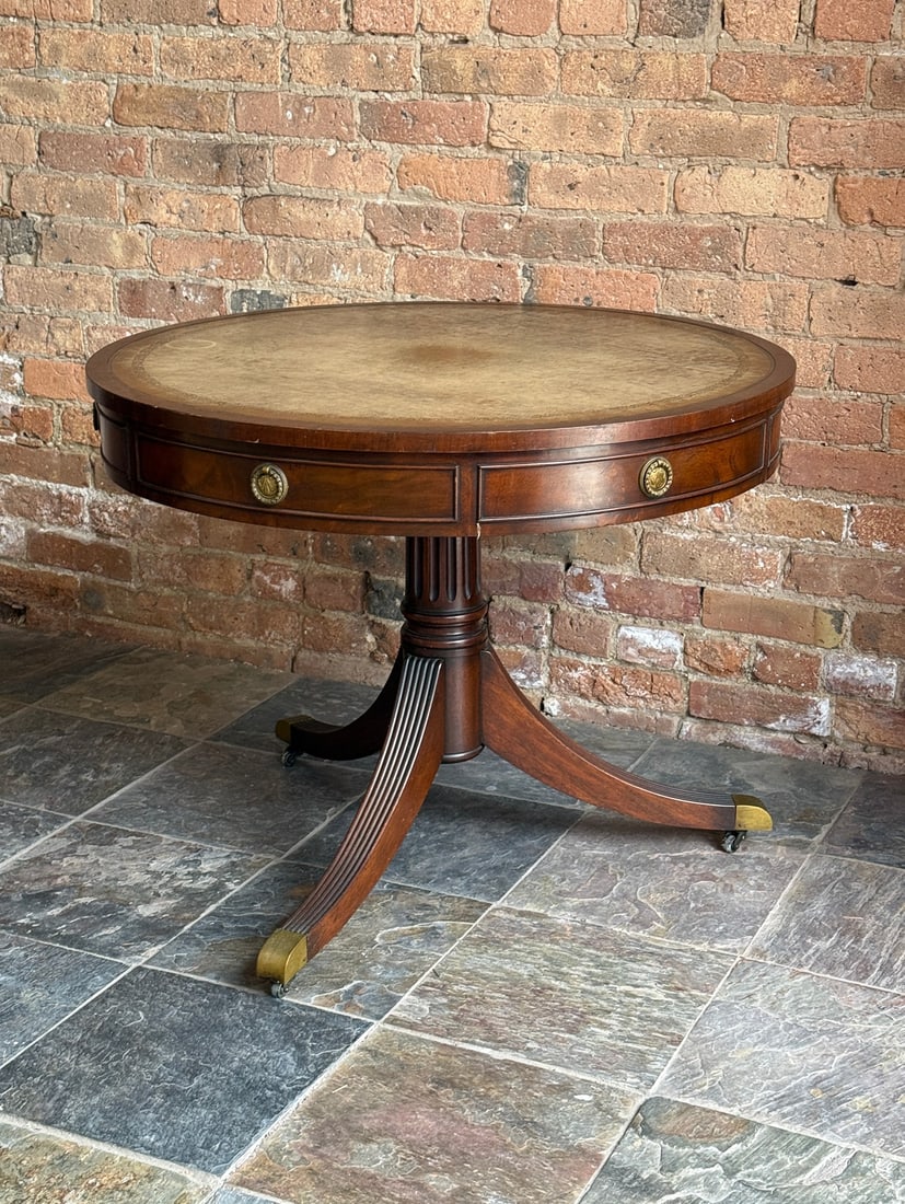 Antique Mahogany Drum Table with Leather Top: Measures 25.5" H x 32.25" diameter.