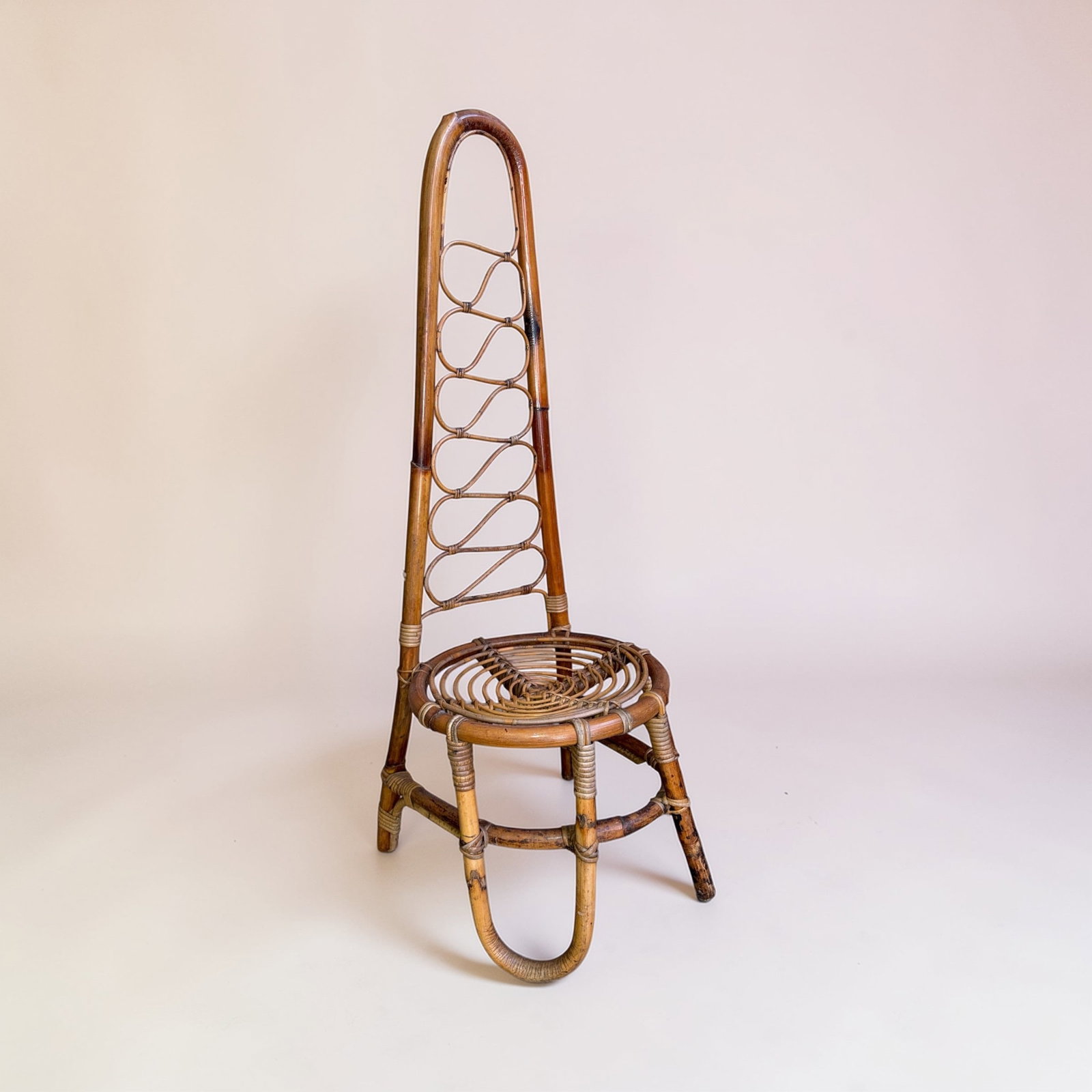 Italian Mid Century BONACINA Bamboo High Back Chair: 46.5" H to back x 15" H to seat x 16" diameter x 16" D. Made in Italy sticker.