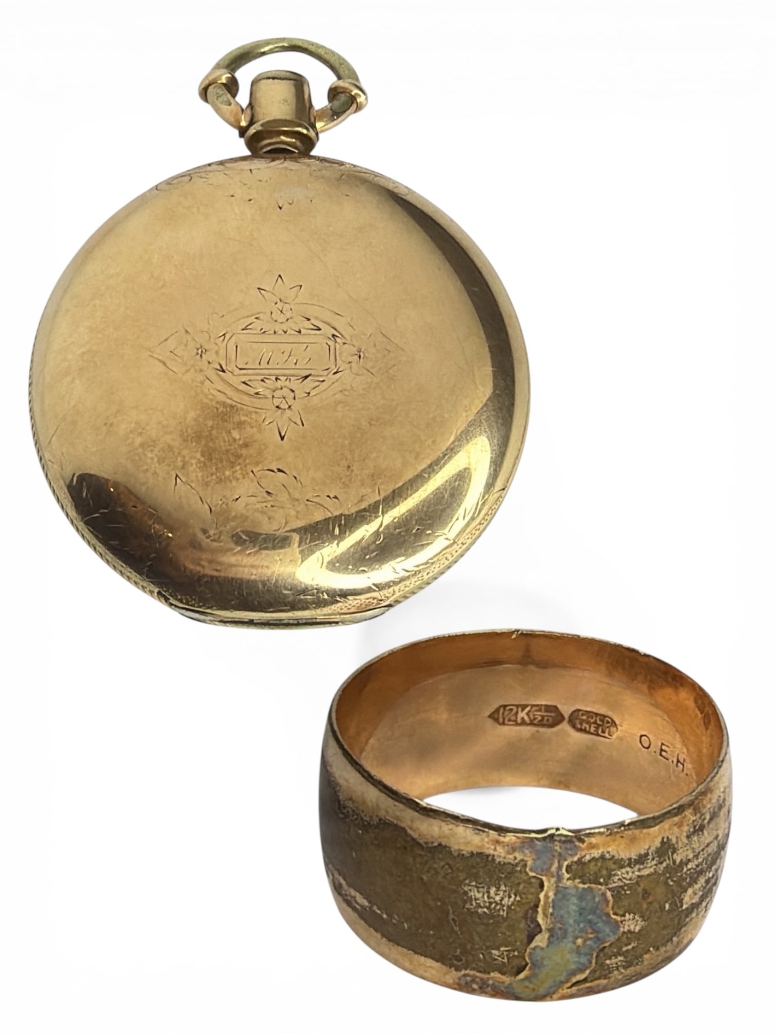Victorian Gold Filled Watch Case & Wedding Band: Watch case is empty and measures 2" diameter. Ring is a size 9.