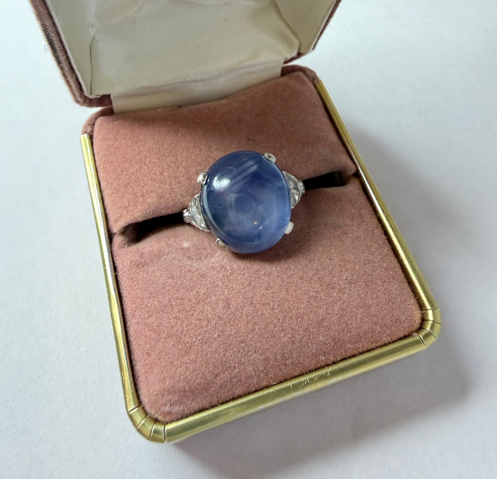 A Platinum, Star Sapphire & Diamond Ring: Reads as a size 5 including sizing beads but fits a size 7 finger comfortably. The star sapphires measures approx. 15mm x 13mm. Ring weighs 6.29dwt including all stones. Half moon shaped diamonds are