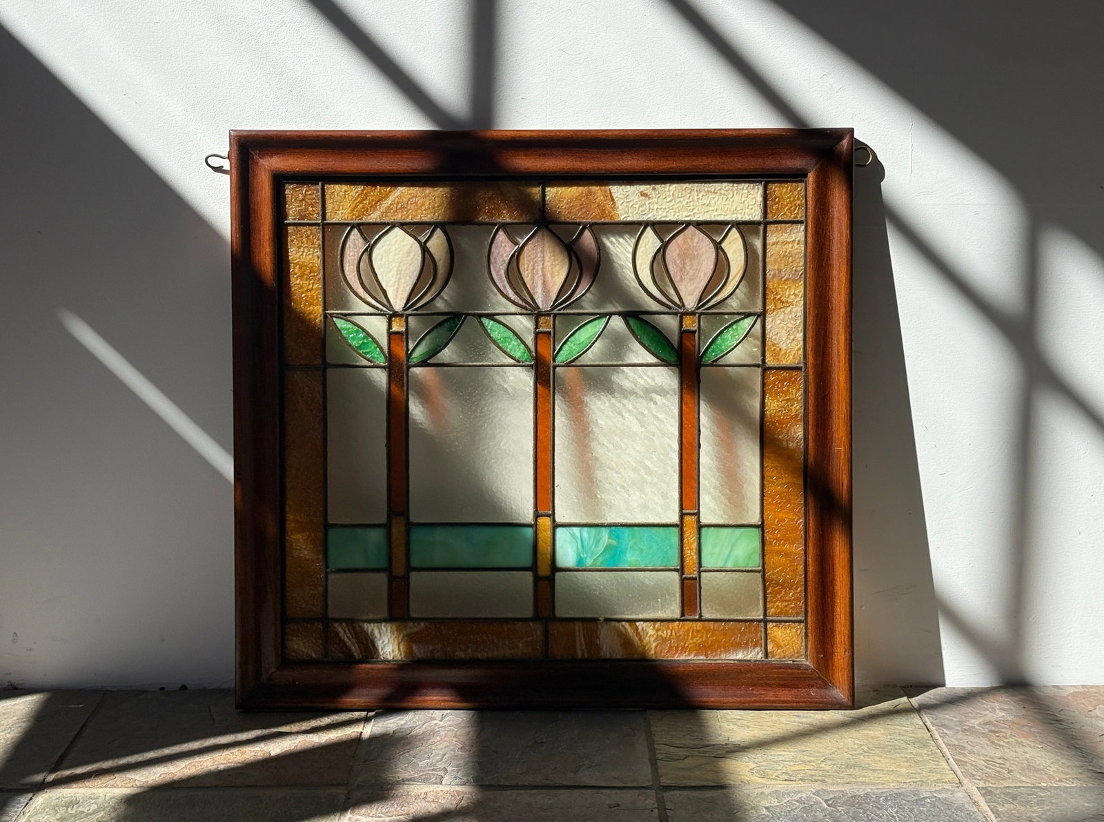 Classic English Tulips Stained Glass Window: Set in a nice oak frame. Measures 26" H x 27.5" W x 1" D.