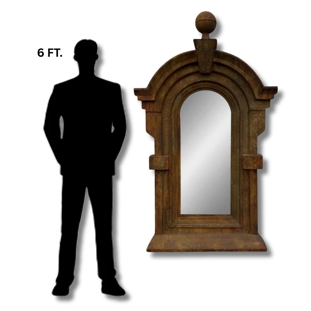 Substantial Industrial Gothic Mirror: Measures 67" H x 41" W x 9" D. Can be used as a wall, floor, or mantle mirror.