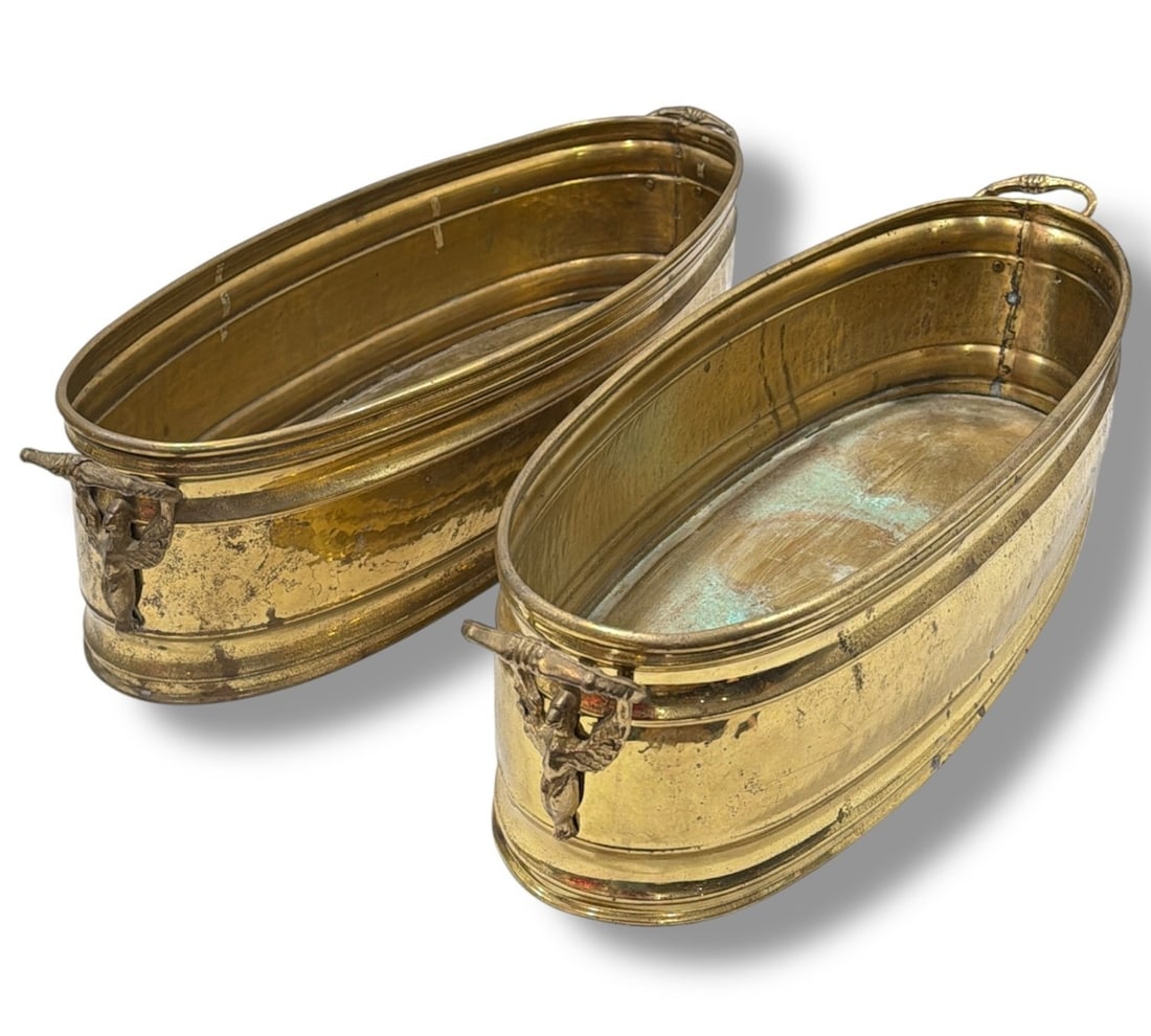 A Pair of Antique French Brass Planter Boxes: Featuring eagle detailed handles. Both measure approx. 5.25" H x 22.5" W x 8.25" D.