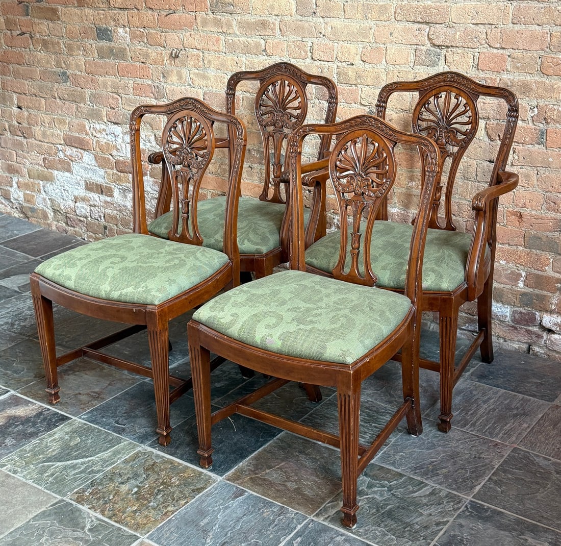 Set of Four George III Style Chairs, Made in England: The armchairs measure 39" H to the back, 19" H to the seat x 24" W x 19" D. The armless chairs measure 37.5" H to the back, 19" H to the seat x 20.5" W x 19" D. Made in England tags.