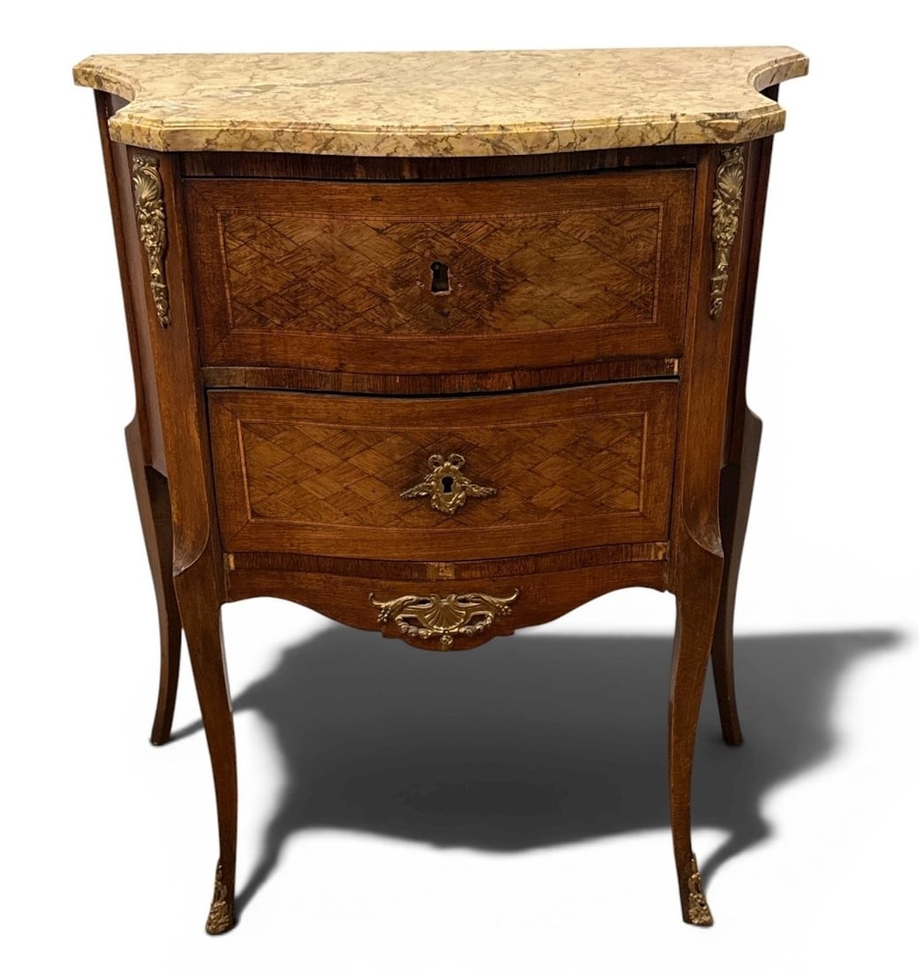 19th C. French Louis XV Marquetry Commode / Nightstand: Marble top, mixed wood inlaid base. Brass detailing. 28.5" H x 24.75" W x 14" D. Purchased from Hanzel Galleries Inc, Chicago.
