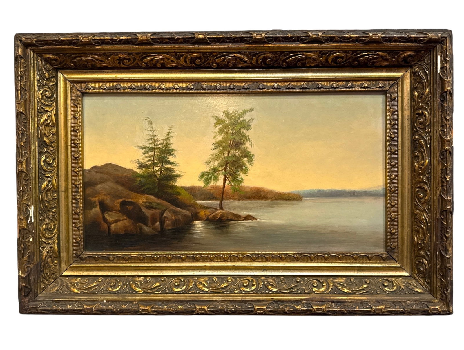 Early 20th C. Sunset River Scene Oil Painting: Measures 13" x 20" x 2.25" D in the frame, sight measures 7.5" x 14.5".