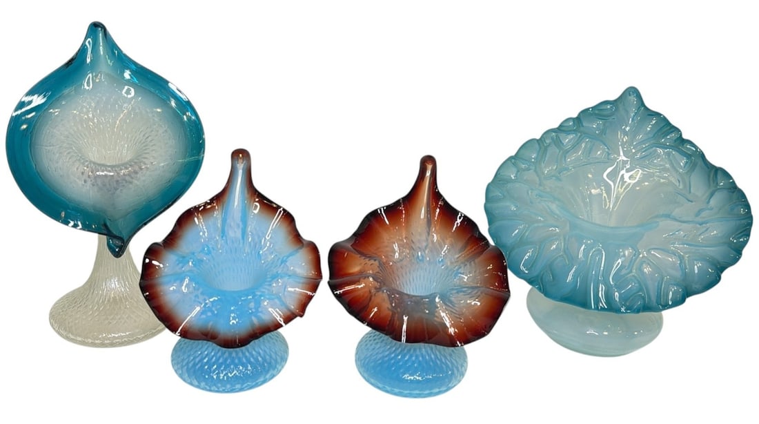 Four Victorian Blue and Oxblood Art Glass Jack In The Pulpit Vases: Features two oxblood and blue crosshatch vases, a taller clear and blue glass crosshatch vase, and a light blue vase. All four are victorian art glass jack-in-the-pulpit vases. The tallest measures 8.