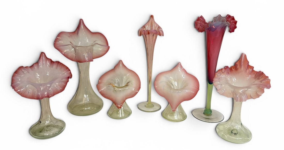 Collection of Uranium and Cranberry Glass Jack In The Pulpit Vases: Includes a beautiful assortment of victorian uranium and cranberry glass jack-in-the-pulpit vases. The largest measures 12" H x 3" diameter. The second largest vase is not uranium glass.