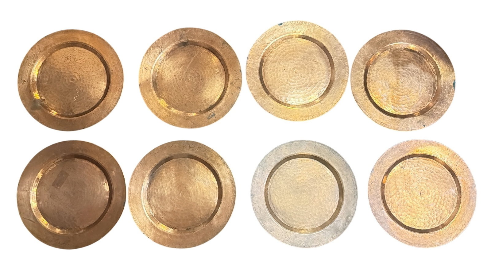 Set of 8 Arts and Crafts Hammered Copper Chargers: All measure 11.75" diameter.