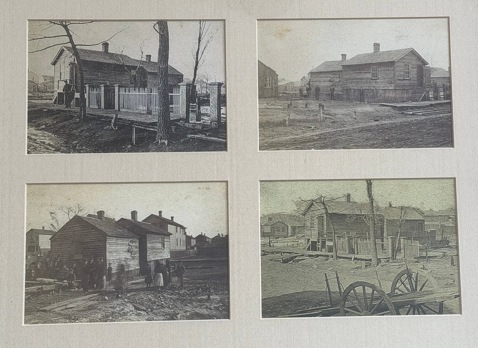Set of Four 19th C. Photographs, Primitive Homes: Features four early photographs in an ornate frame. Images are likely long exposure and desist apparently new buildings and structures in the town. Measures 23.25" x 27" x 2.5" D in the frame, each pi