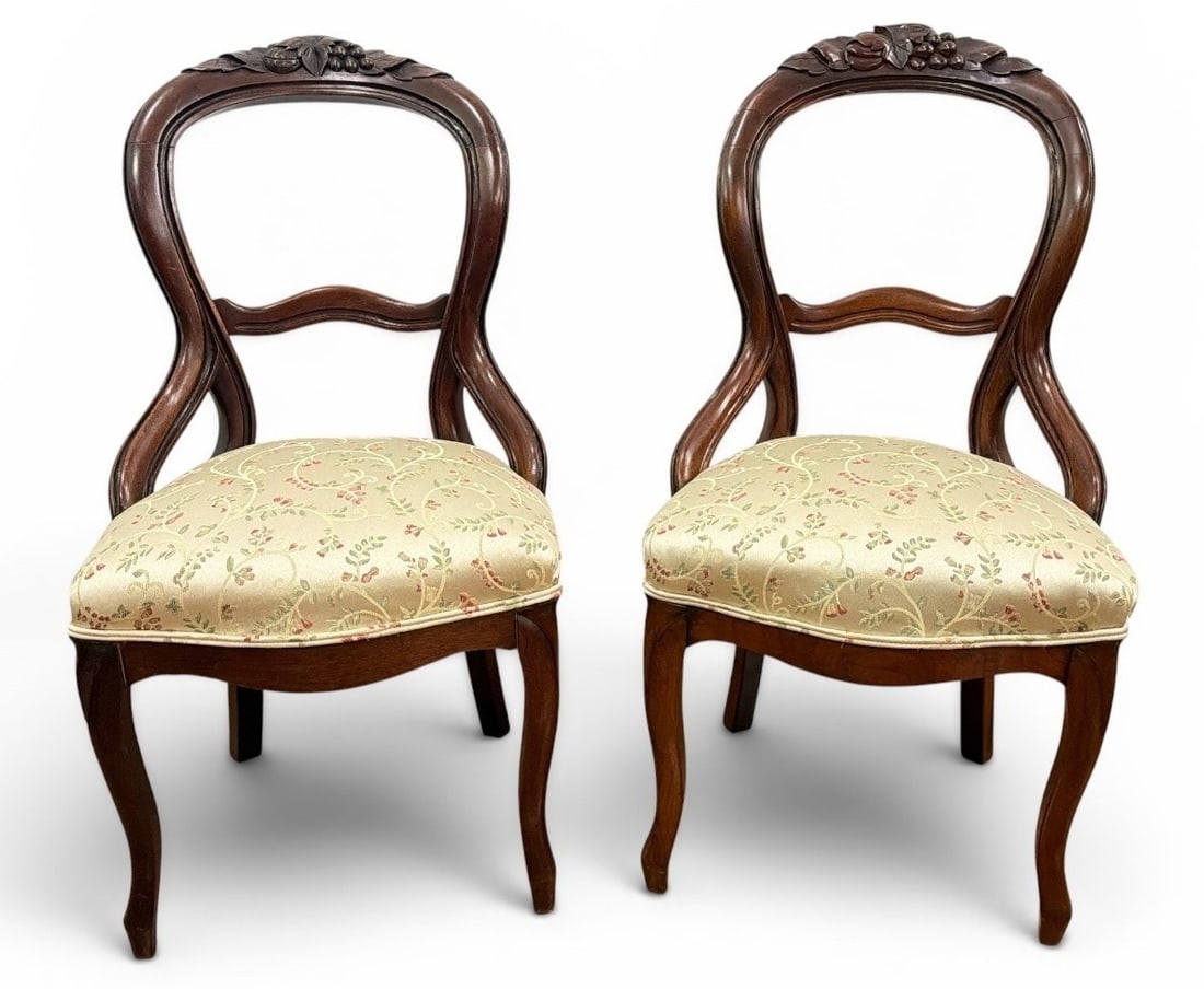 A Pair of Victorian Balloon Back Chairs: Measures 36" H to the back, 18" H to the seat x 19" W x 19" D.
