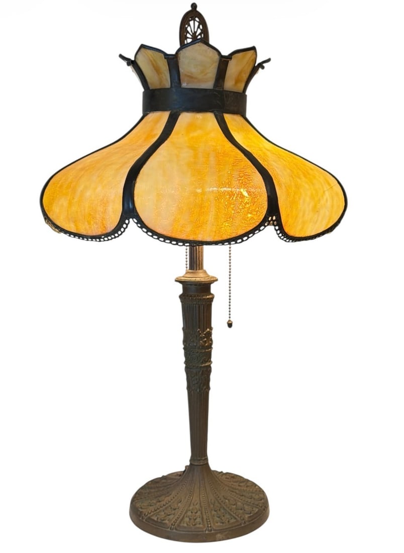Early 1900's Caramel Slag Glass Lamp: Features lace-like detailing on the shade, acorn pulls, and a spiderweb finial. Measures 25.5" H x 14.5" shade diameter, 7" base diameter.