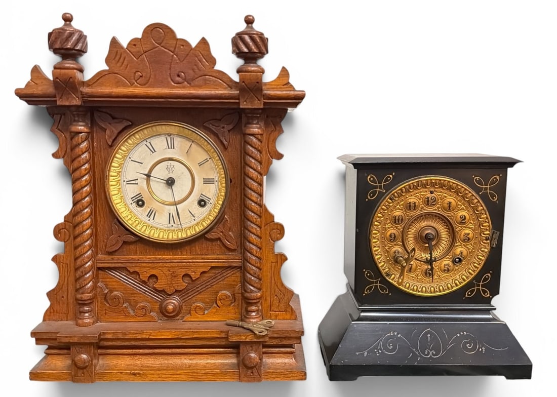 Two Antique Mantle Clocks, WATERBURY, ANSONIA: Ansonia Clock Company mantel clock measures 10.25" H x 9.5" W x 5"D. Waterbury Gingerbread mantle clock measures 16" H x 12.5" W x 5.5" D.