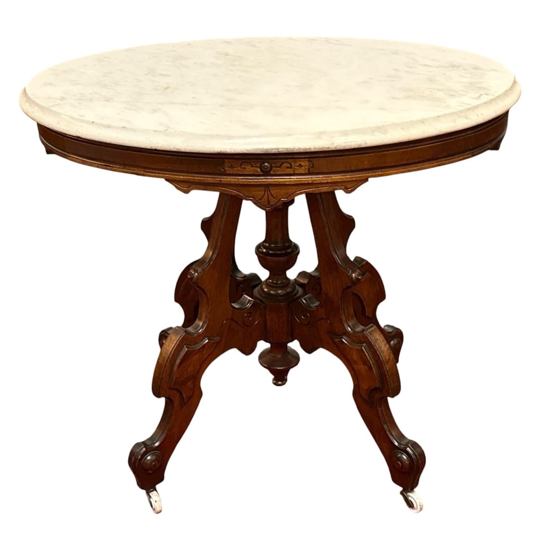 Antique Victorian Renaissance Revival Marble Top Parlor Table: 31" H x 34" W x 25.25" D.