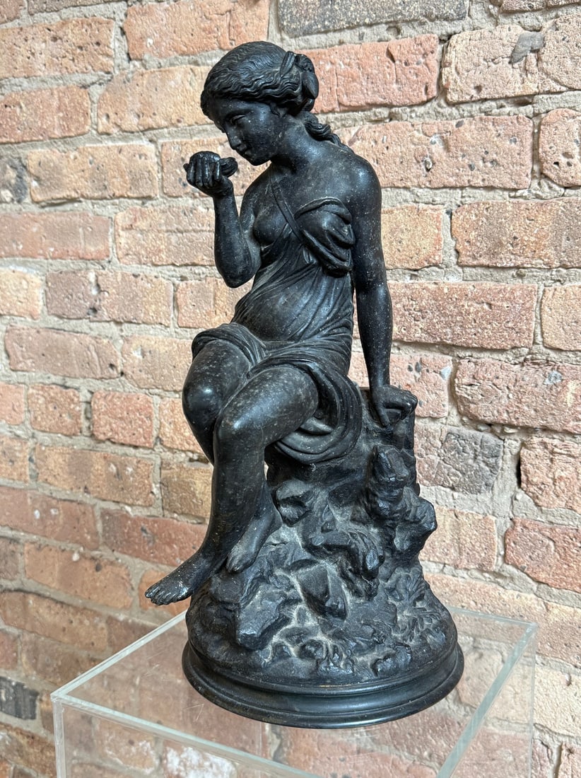 French Bronze of Woman, After MATHURIN MOREAU: Marked Bte S.G.D.G. on the back. Appears to have an opening at the back, possibly for a candle. Measures 18.5" H x 9" overall diameter, 10" D.