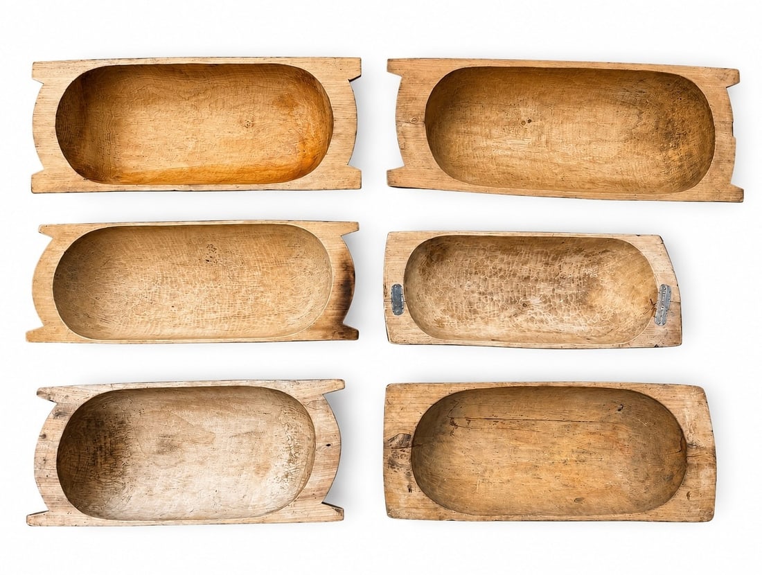 Six Primitive, Hand Hewn Dough Bowls: Largest measures 8.5" H x 48.5" W x 19.25" D. Various sizes.