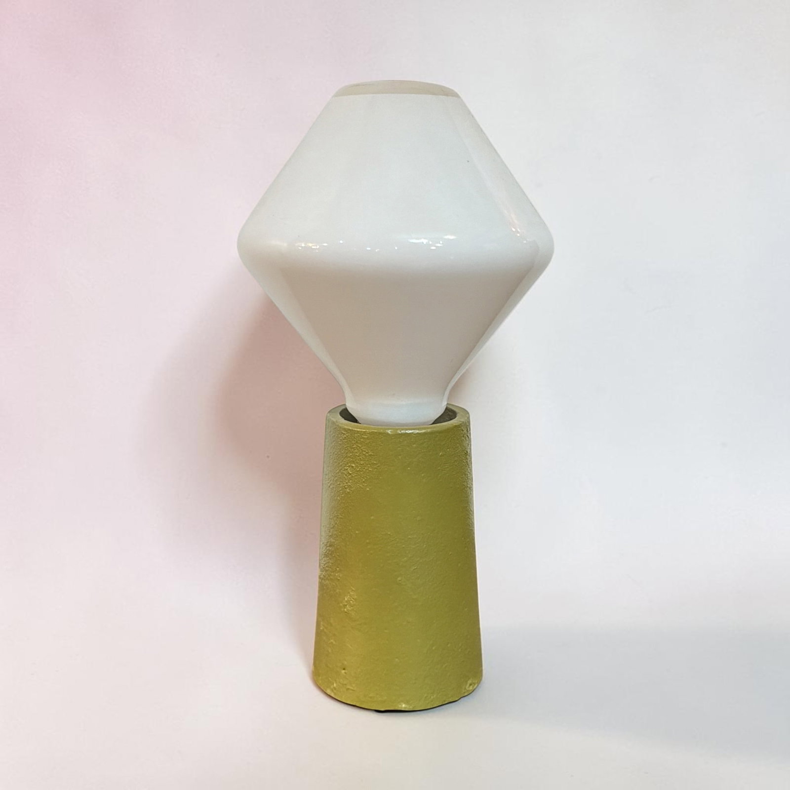BILL CURRY (American, 1927-1971) Design Line Pick Up Lite: Pick Up Lite table lamp, turns on and off by picking up the lamp off the table. Measures 8" H x 2.25" diameter. Retains labels to underside.